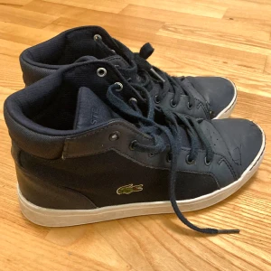 Vintage mörk blåa Lacoste skor size 38 -  storlek: 38  Pris 350kr
