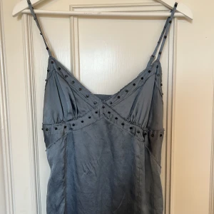 Linne - Topp från Calvin Klein jeans köpt second hand. Kan justeras i banden. 