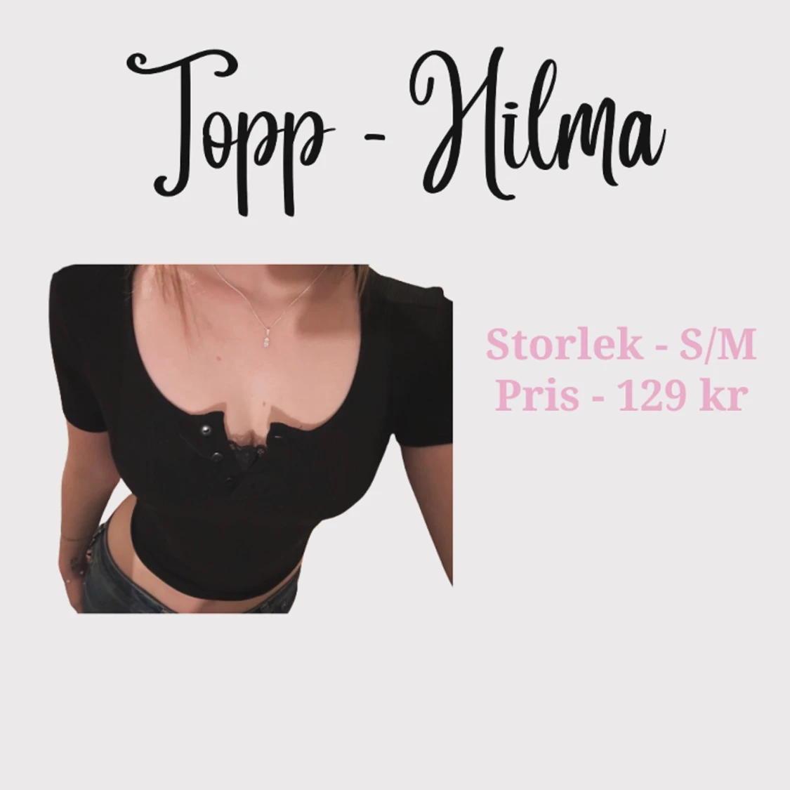 söt topp med knappar och en spets