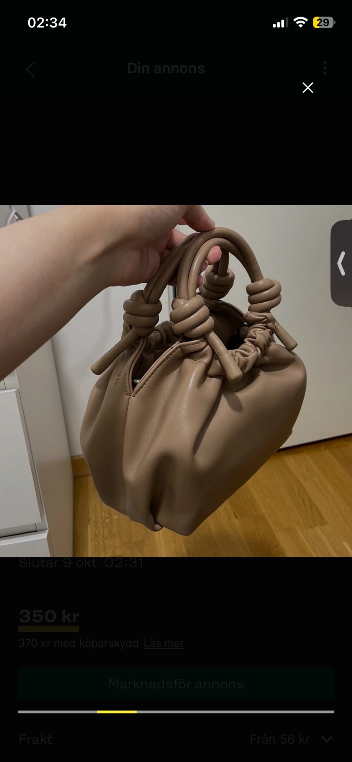 Beige bucket bag med knutdetaljer - 1