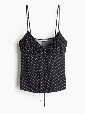Prickig topp - Prickig topp från h&m i storlek xs, slutsåld på hemsidan