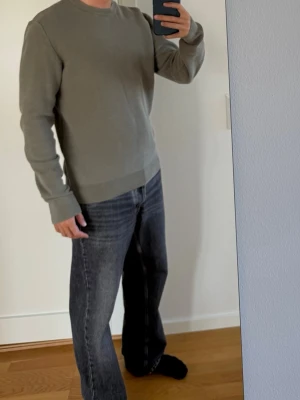Stickad tröja  - Khaki färgad stickad Cubus tröja. Storlek M.