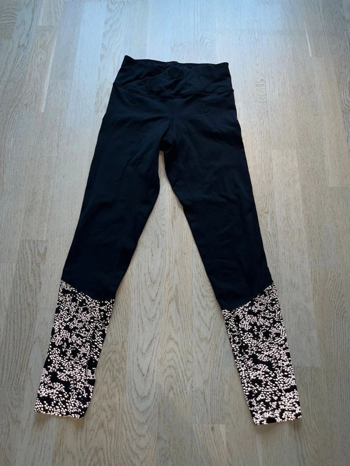 Svarta leggings med reflex ben - 1