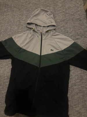 Lacoste zip hoodie - Passar även S