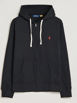 Svart zip hoodie från Polo Ralph Lauren - Svart hoodie med dragkedja från Polo Ralph Lauren. Klassisk design med vit dragsko i huvan, kängurufickor och röd broderad logga på bröstet. Tillverkad i mjuk bomullsblandning, perfekt för en chill och stilren look. Helt ny säljer eftersom den va för liten, passar s-m.