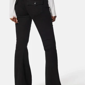 Svarta true religion jeans - Svarta lågmidjade true religion jeans, joey modell. Väldigt bra skick. Storlek 27 Skriv för egna bilder