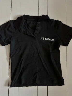 Cool piké - Pike med falcon logga! Ascool men ej kommit till användning