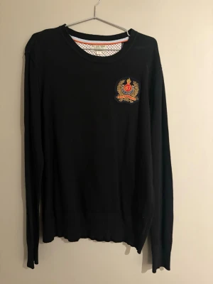 Svart stickad tröja Polo Jeans Company - Säljer denna tröja då jag aldrig använder den. Den är i mycket bra skick!