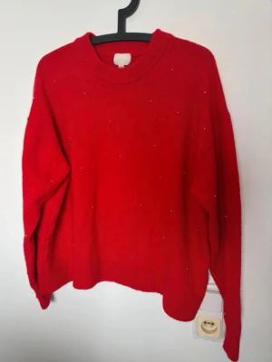 Stickad tröja ifrån hm  - Fint skick använd lite stl XL 