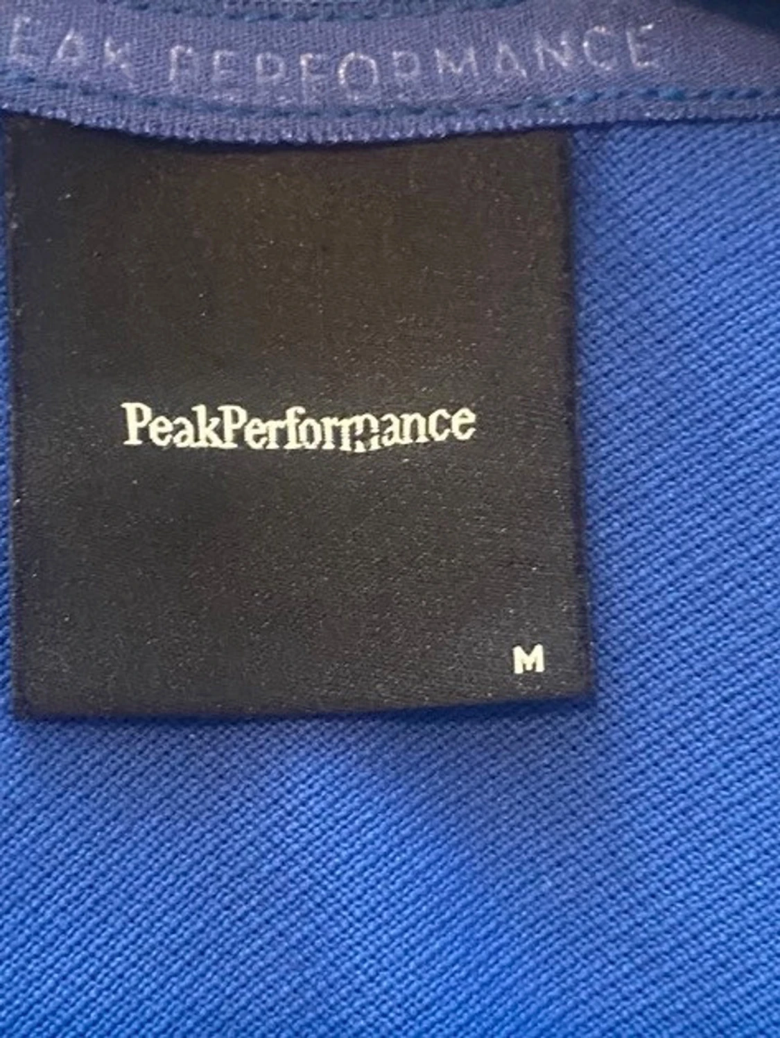 Blå piké från peak performance  - 2
