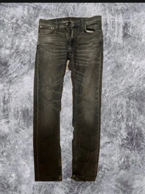 Nudie jeans, Lean Dean  - Snygga gråa jeans från nudie. Slim fit i storlek w30 L32