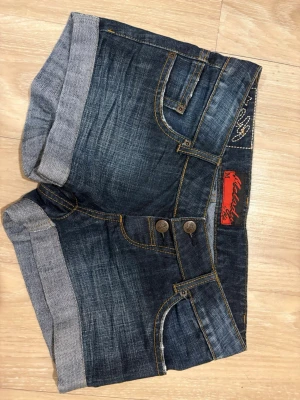 Vintage Y2K denim low rise mini shorts - Selling these adorable low rise shorts. Bought these at a thrift so not quite sure of it’s origin, but the shorts seem almost brand new. It says M but I’d say it fits as an S maybe even an XS.None the less I know these will be perfect for summer. For further questions please contact me🦭🤍