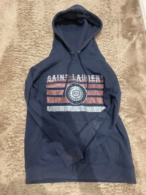 Saint Laurent Hoodie - Mörkblå hoodie från Saint Laurent.