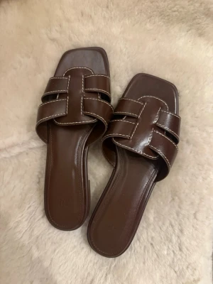 Bruna slip-in sandaler  - Aldrig använda