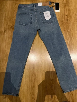 Realaxed Ljusblåa jeans - Jack & Jones Jeans. Straight/Realaxed. Ljusblåa och superskönt material! Oanvända (endast provad)