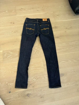 Nudie jeans lean dean - Säljer dessa snygga nudie jeans i den populära modellen lean dean, storlek w31, L32! Inga defekter förekommer, precis som nya😊. Kom gärna med prisförslag och frågor!