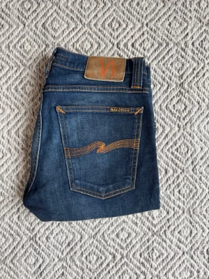 Nudie jeans - Nudie jeans - Modell: Tube Kelly - Storlek: W27/L32 - skick: 9/10 - Nypris runt 2000kr