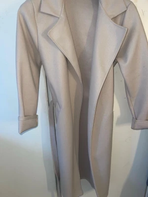 Beige kappa - Helt ny, använd endast 2 gånger. XS/S. Finns i Göteborg💕