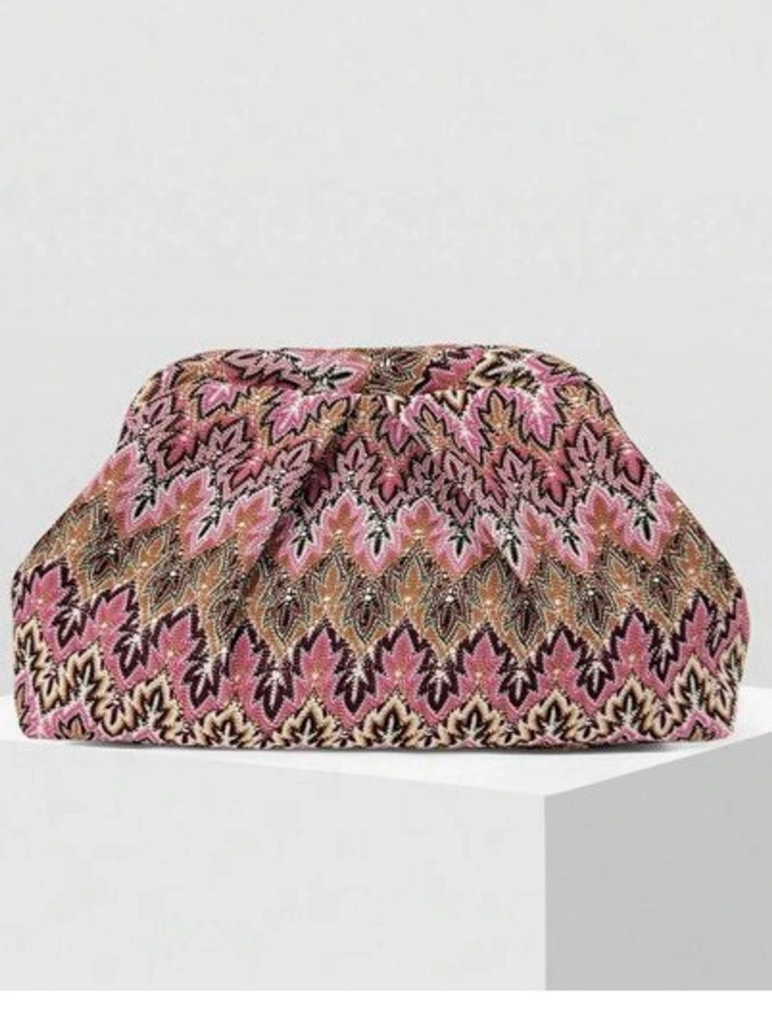 Mönstrad clutch bag