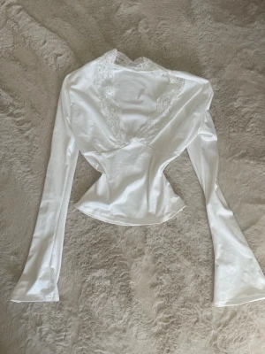 Vit spetstopp - Vit spetstopp som aldrig blivit använd.