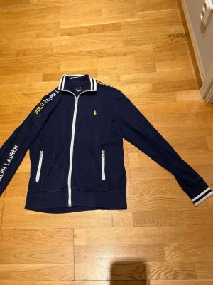 Marinblå ziptröja  Polo Ralph Lauren - Skriv vid funderingar