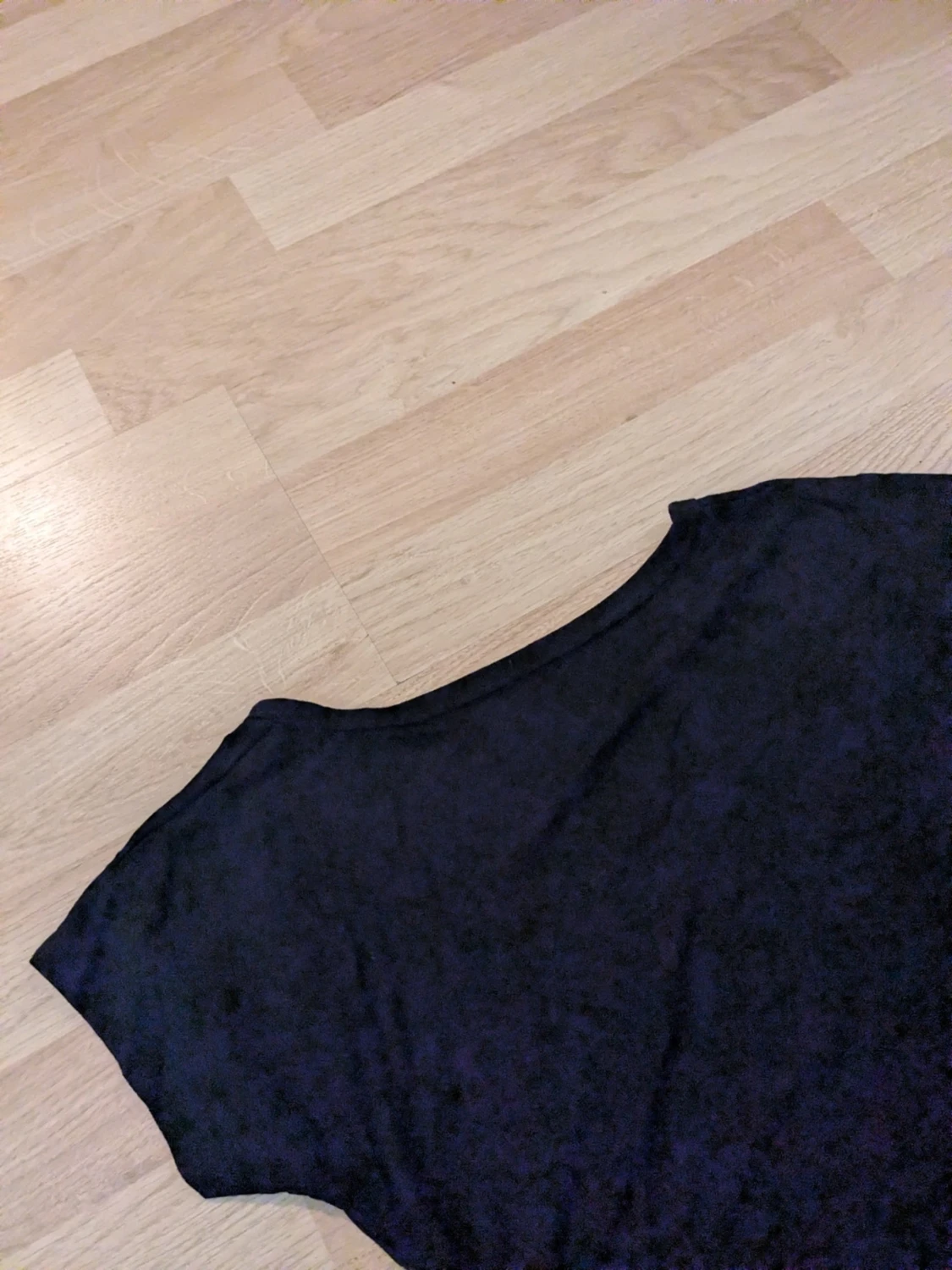 Svart kortärmad topp med öppen rygg stl. S - 1