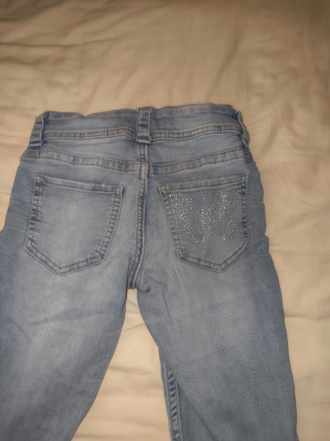 Ljusblå bootcut jeans med strass - 1