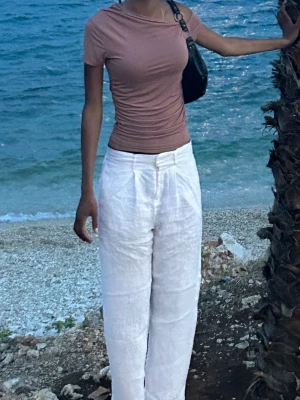 Rosa topp  -  Säljer den rosa toppen i bilden 