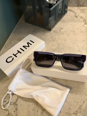 Chimi 05 blue - Chimi 05 i bra skick! Inga repor eller dylikt. Medföljer originalfodral och tygpåse.