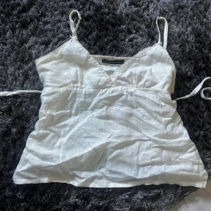 Brandy Melville topp - Säljer denna jätte gulliga knyt toppen från brandy Melville 