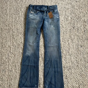 Diesel jeans - Supersnygga lågmidjade bootcut jeans från Diesel men köpta på Sellpy🩷De är i mycket bra skick och säljer då de tyvärr inte passade mig🥲