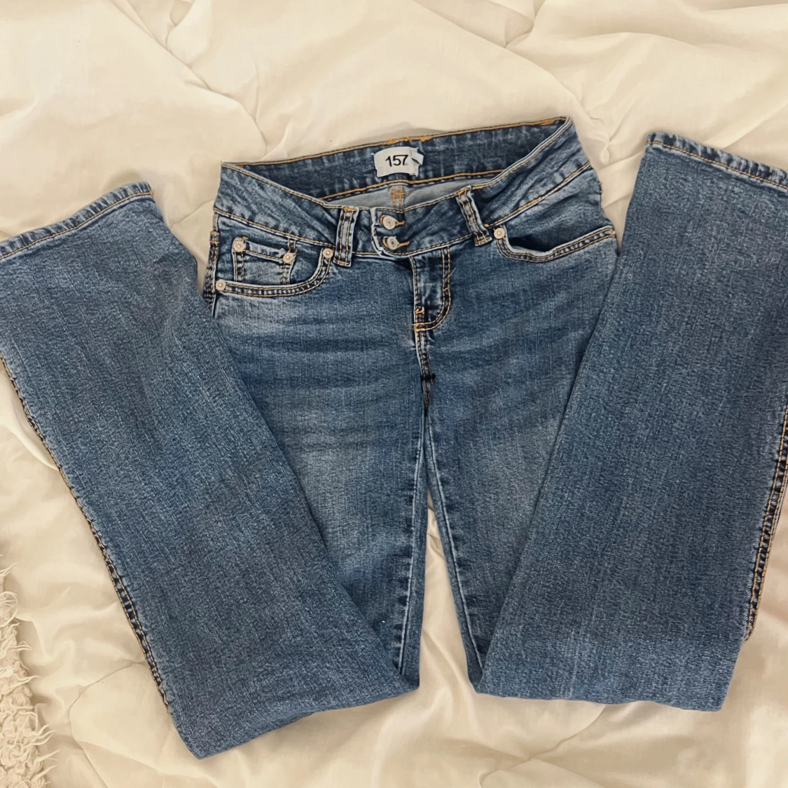 Blå bootcut jeans från 157 - 3