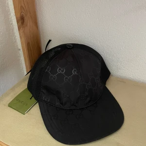 Keps  - Gg keps helt ny kommer med påse 