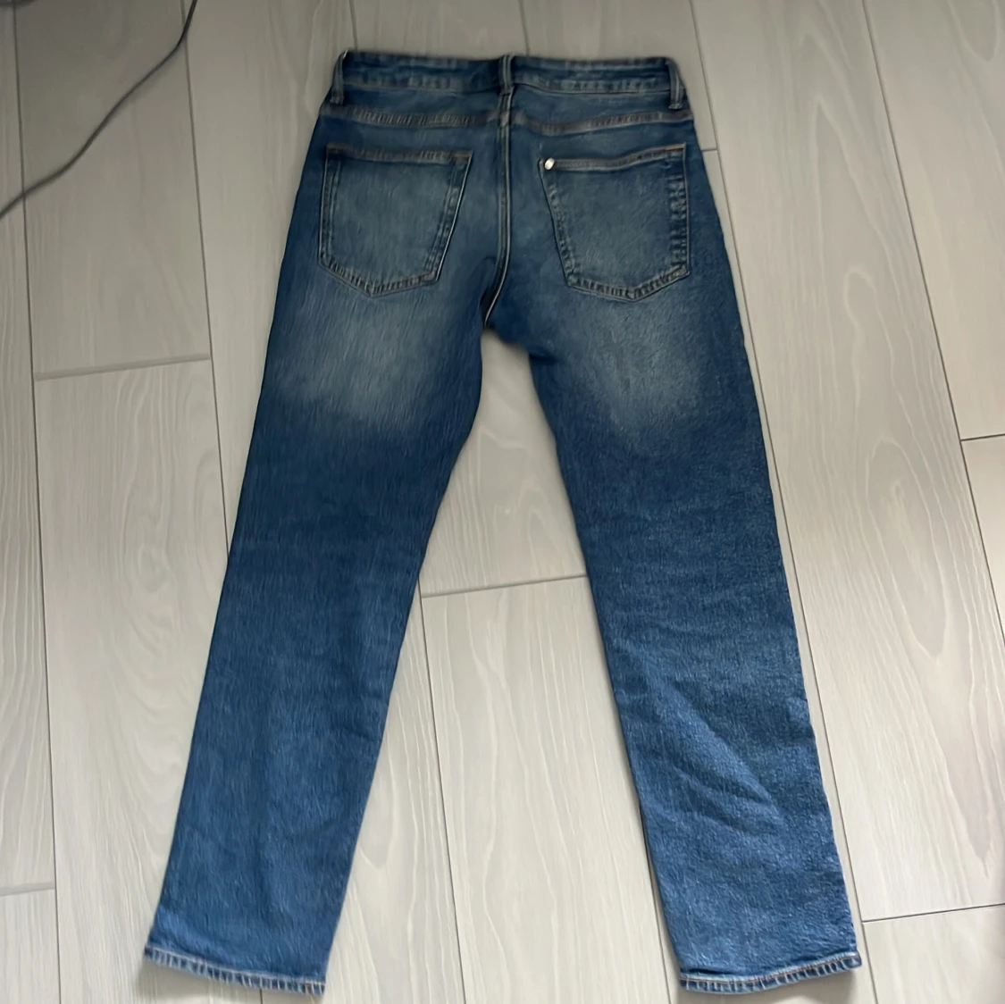 Blå straight jeans från H&M - 1