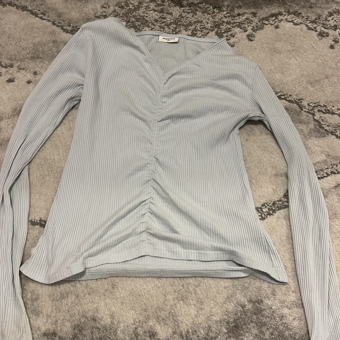 Ljusblå ribbad topp från Kappahl