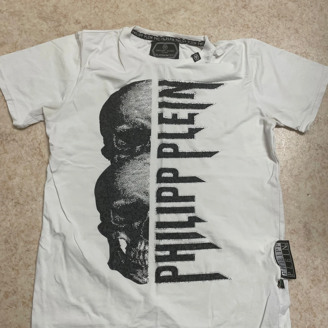 Vit t-shirt med döskalletryck från Philipp Plein