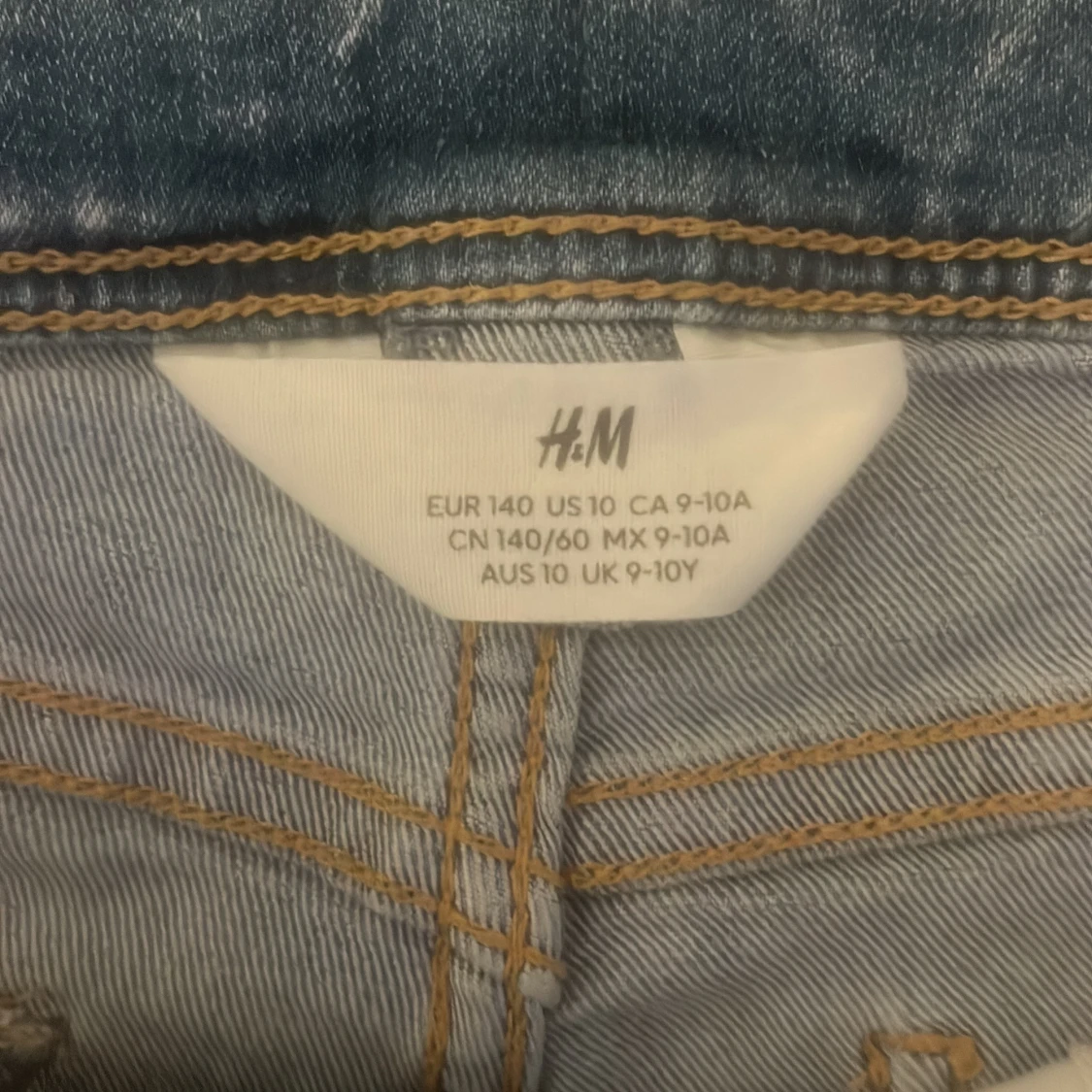 Blå lågmidjade jeansshorts  - 3