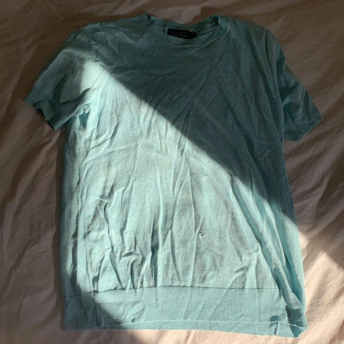 Ljusblå stickad t-shirt från Zara Home - 1