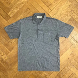 Blackberry grey cotton “Filo di Scozia” knitwear polo, 54 (XL) - Blackberry grey cotton “Filo di Scozia” knitwear polo                                                                                Size 54 (XL)                                                 Measurements:                                                    Shoulders 55cm Sleeves 26cm Armpits 60cm Length 76cm