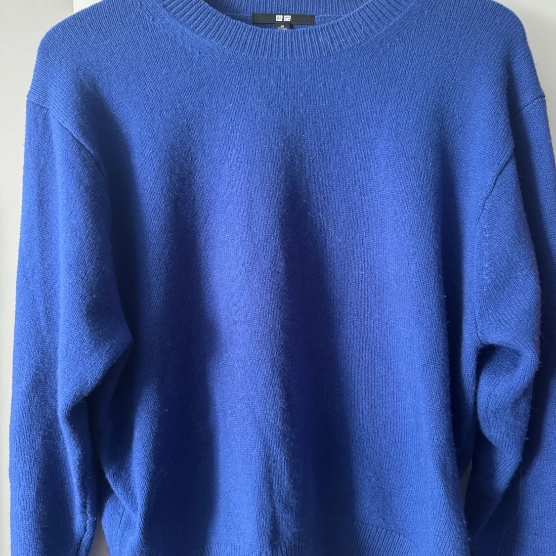 Blå stickad tröja från Uniqlo - 1