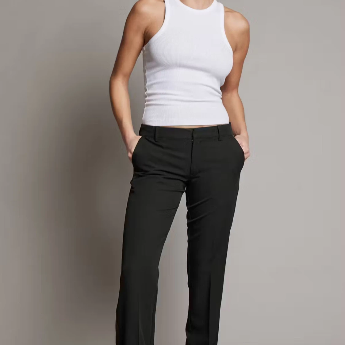 Svarta kostymbyxor