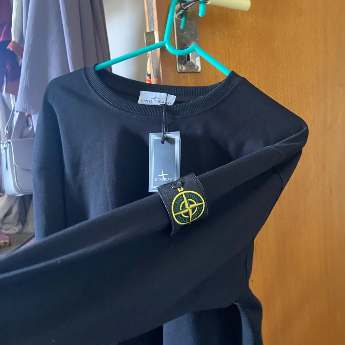 Svart sweatshirt från Stone Island - 1