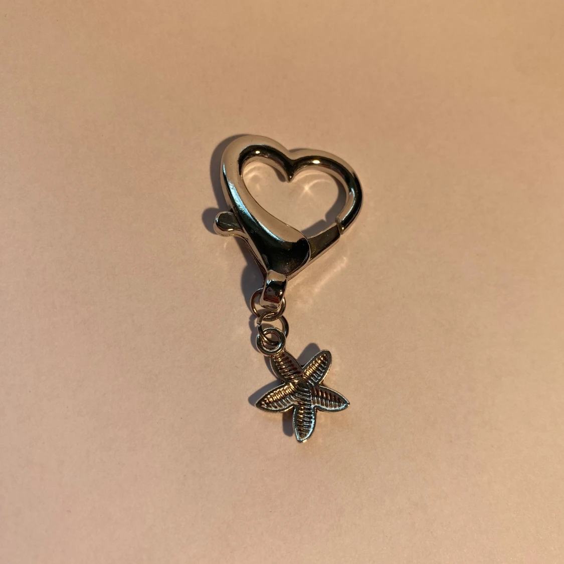 Nyckelring med hjärtlås och sjöstjärna - 1