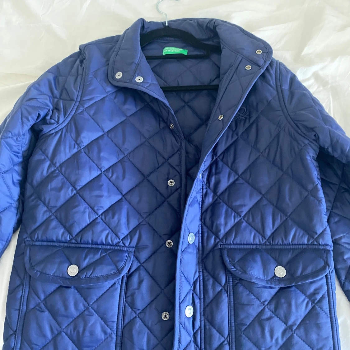 Blå quiltad jacka från United Colors of Benetton