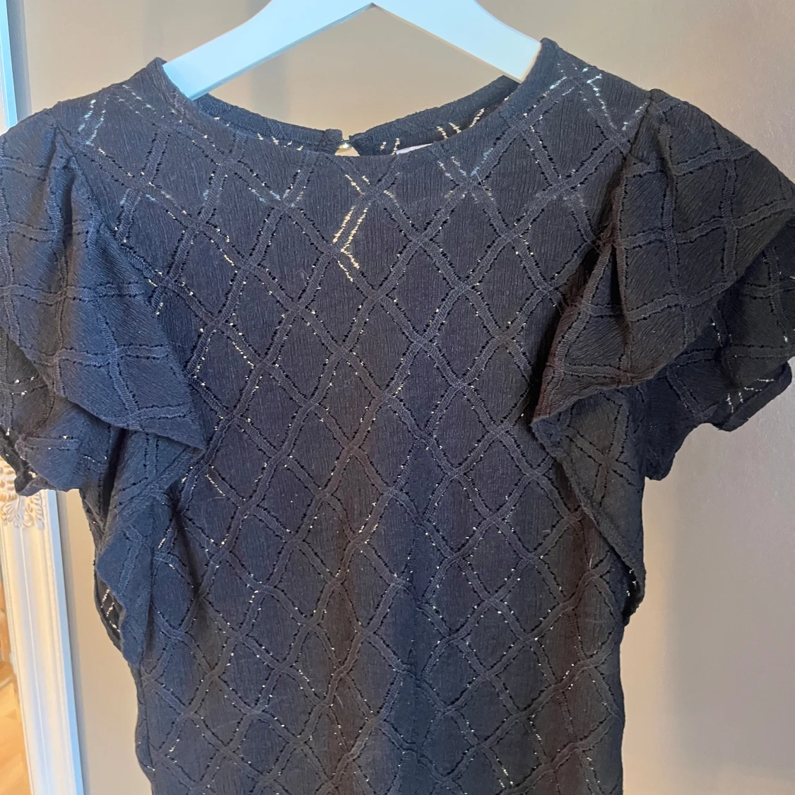 Svart blus från Holly & Whyte