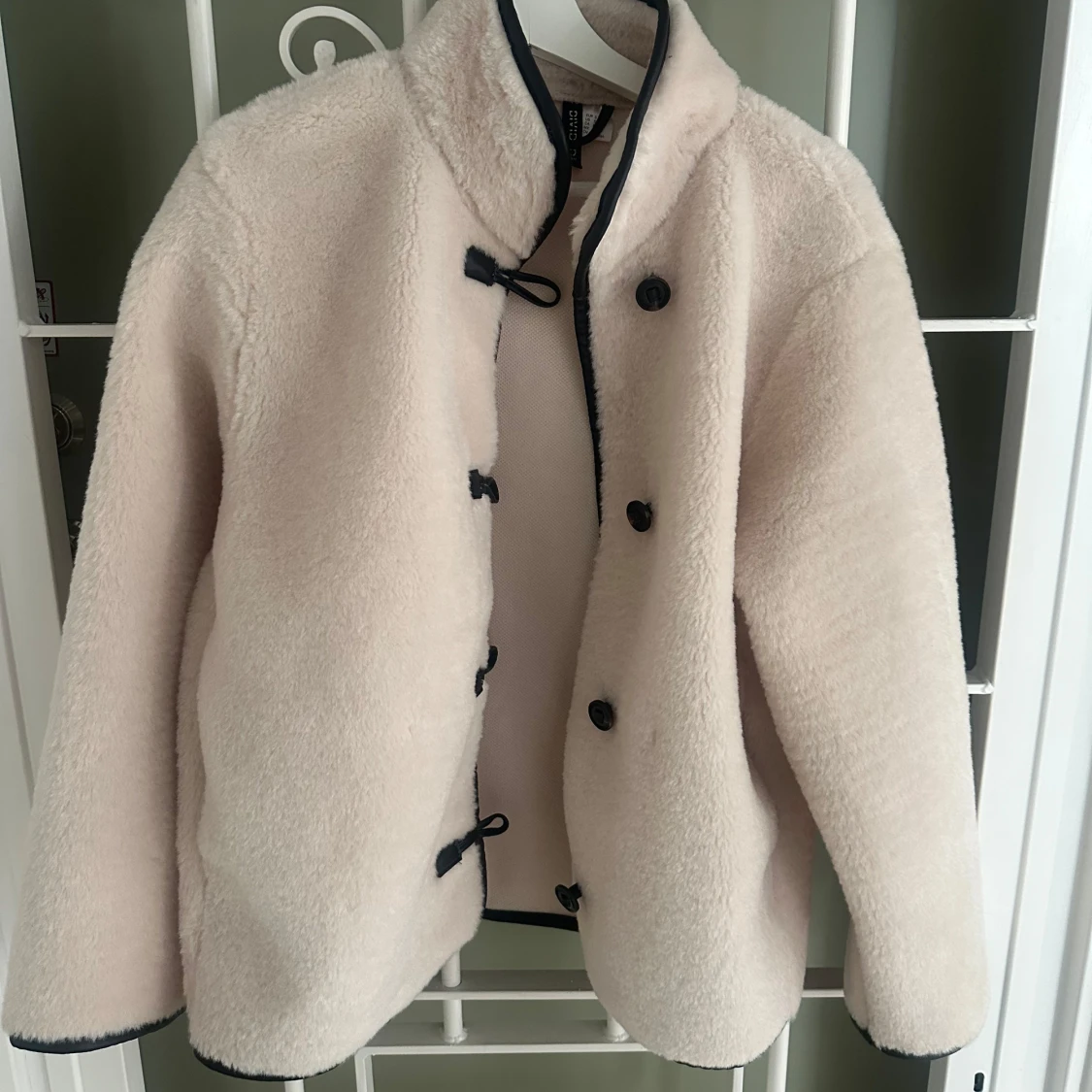 Beige teddyjacka från H&M