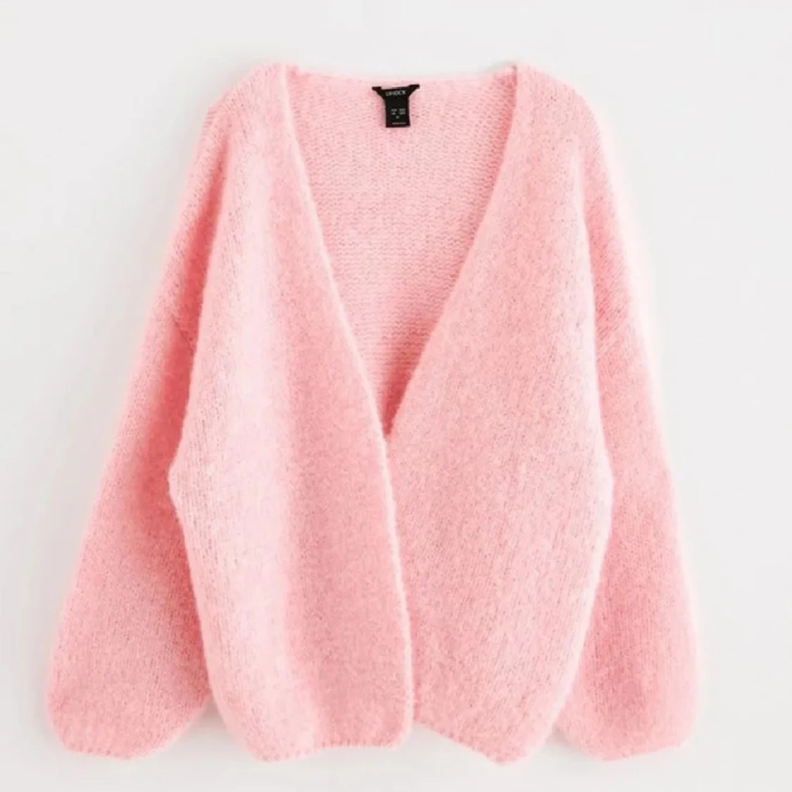 Rosa fluffig kofta från Lindex