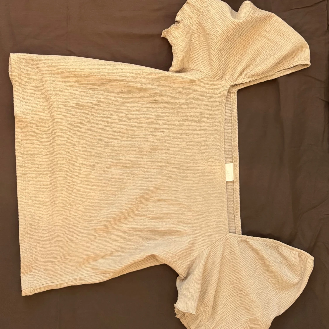 Beige och blå toppar med puffärm