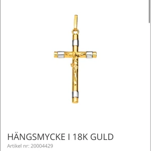 18K Guldfynd korshänge i guld  - Snyggt korshänge från Guldfynd i guld- och silverfärgad metall. Hängsmycket har en klassisk korsform med detaljerad Jesusfigur och blanka ytor. Perfekt att bära i en kedja för en stilren och personlig look. Köptes för 3 298kr,  pris kan diskuteras vid snabb affär