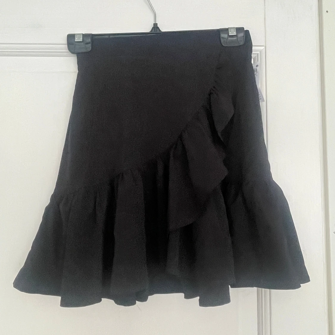 Svart volangkjol från Linne XS